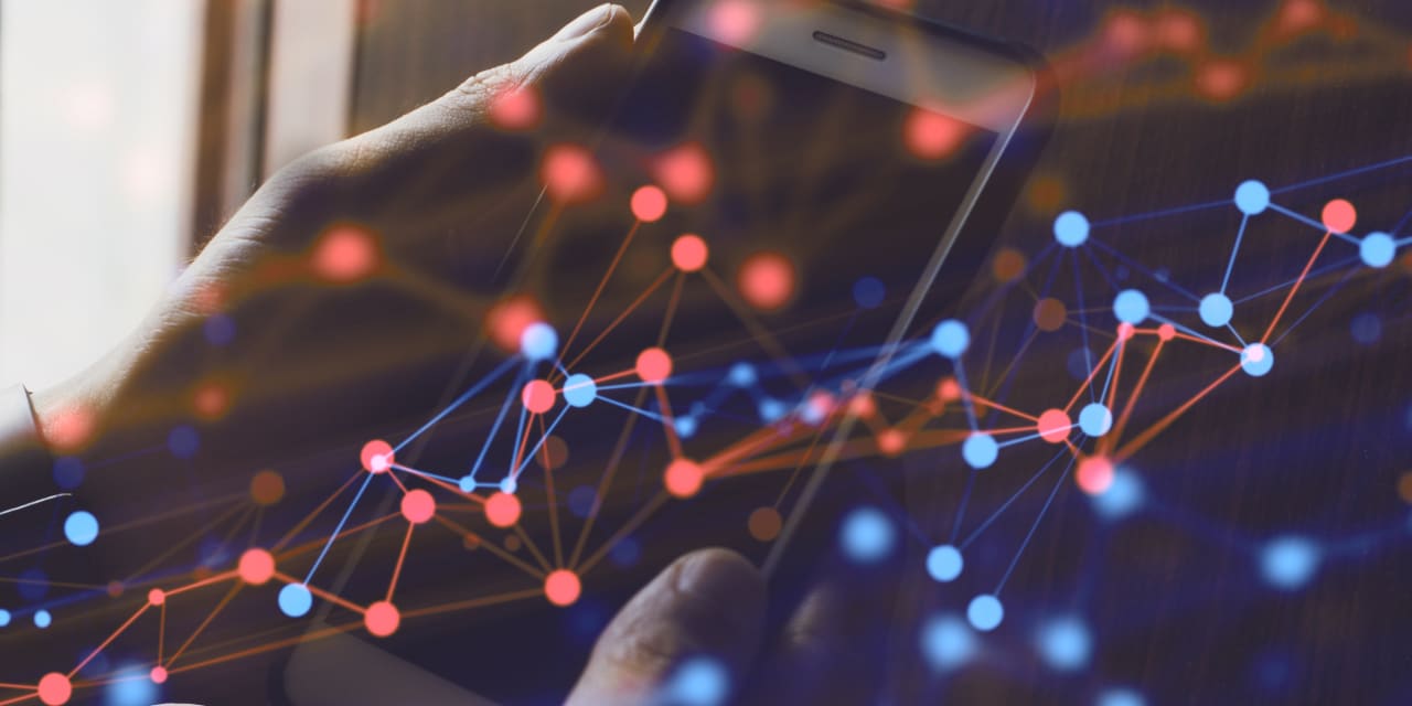 Microsoft, Amazon Stocks Dumped by AI Robot Trader. Here's What It Bought.