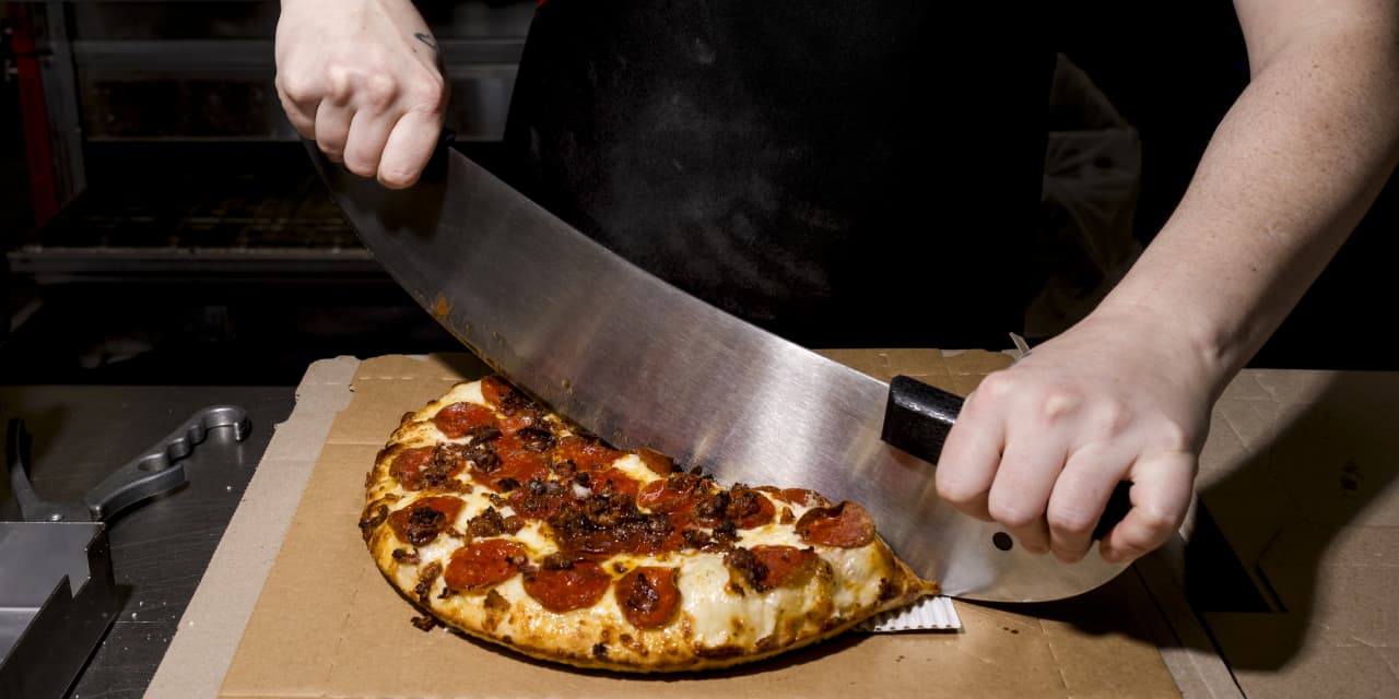 CITIGROUP LOWERS TARGET PRICE FOR DOMINO'S PIZZA INC TO $425 FROM $440